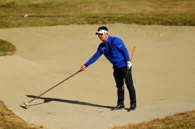 Y E Yang keeps the lead by 4 strokes on Day 2 thanks to his wife