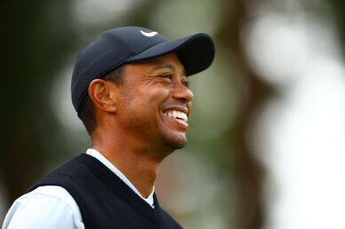 "No fans allowed" but fans called out "Tiger" from outside the course to cheer him